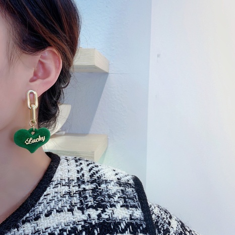 Korean niche design sense flocking green heart rabbit earrings wholesale  NHENY602999's discount tags