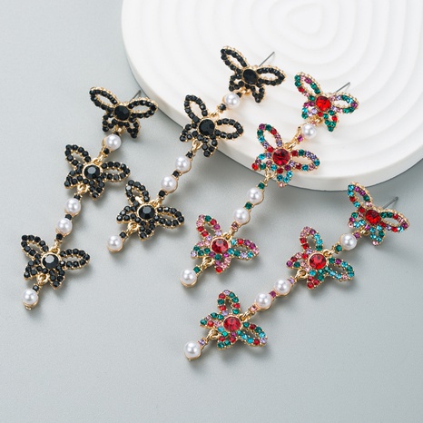 fashion rhinestone butterfly long pearl alloy earrings wholesale NHLN603305's discount tags