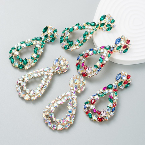 Pendientes exagerados de cristal coloreado con diamantes de imitación de aleación nueva de moda al por mayor's discount tags