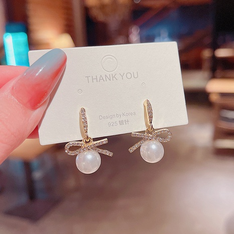Korean style new full diamond bow pearl pendant alloy earrings's discount tags