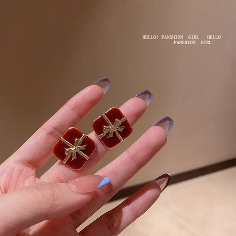 Korean style alloy square drop oil bow stud earrings's discount tags