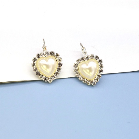 retro simple rhinestone pearl heart alloy earrings female wholesale  NHGO603488's discount tags