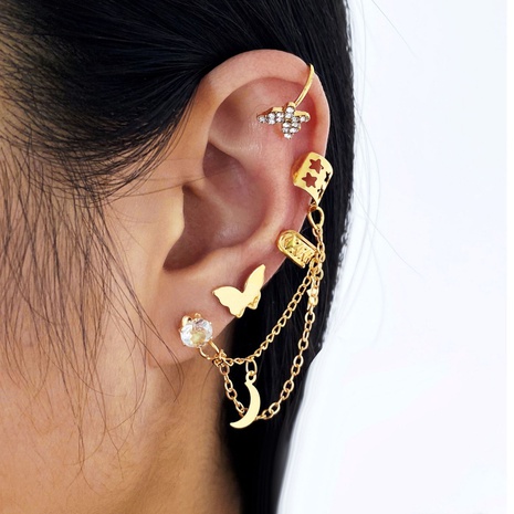 Nuevo conjunto de 4 piezas con clip de hueso del oído de aleación en forma de C de luna estrella dorada mariposa de diamante completo's discount tags