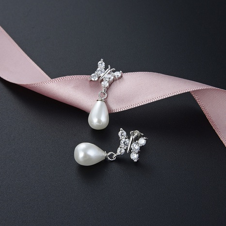 fashion geometric pearl 925 silver butterfly jewelry earrings wholesale NHDNF608283's discount tags