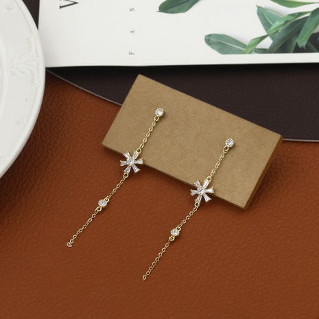 Classic Simple Copper Inlaid Zircon Snowflake Long Earrings NHIK616758's discount tags