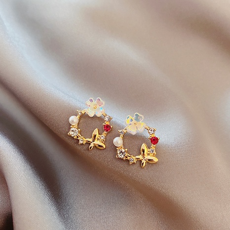 Art- und Weiseblumenschmetterlingszirkon einfache Diamant-besetzte Ohrringe Kupferohrschmucksachen's discount tags