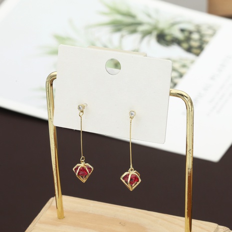 Boucles d'oreilles en cuivre de mode en métal incrusté de zircon rouge géométrique classique's discount tags