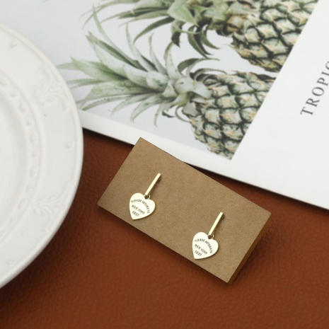 Simple Classic Heart-shaped tide zircon copper Earrings NHIK620351's discount tags
