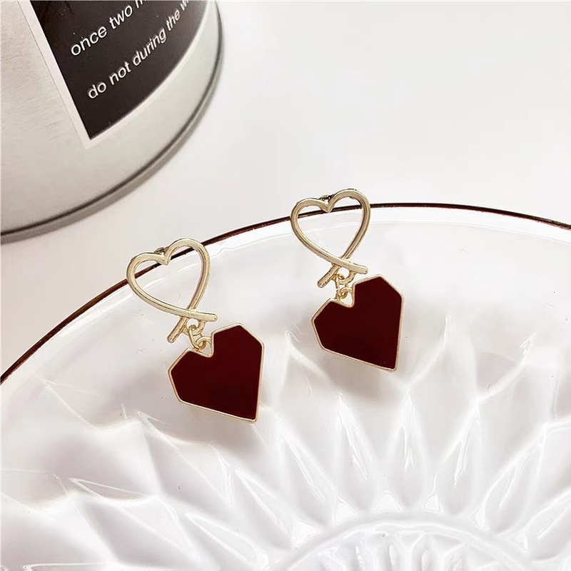 fashion contrast color hollow double heartshaped metal earrings wholesale
