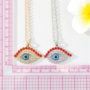 retro full rhinestone hollow eye red eyelashes contrast color pendant necklacepicture8