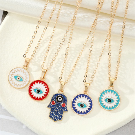 retro ethnic color drop oil Turkish devil eye palm pendant metal necklace NHGO620833's discount tags