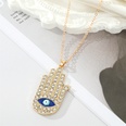 retro oversized full rhinestone eye palm metal necklace keychain hand pendantpicture11