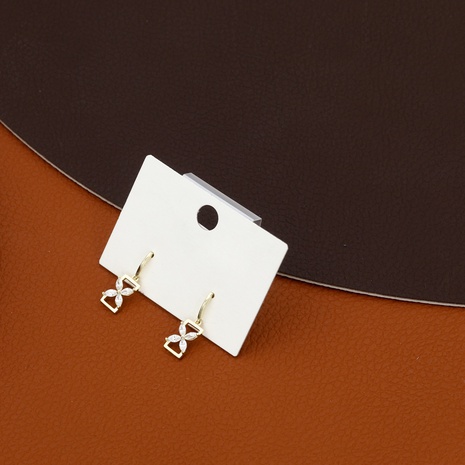 boucles d'oreilles géométriques en cuivre floral classique de niche de luxe's discount tags