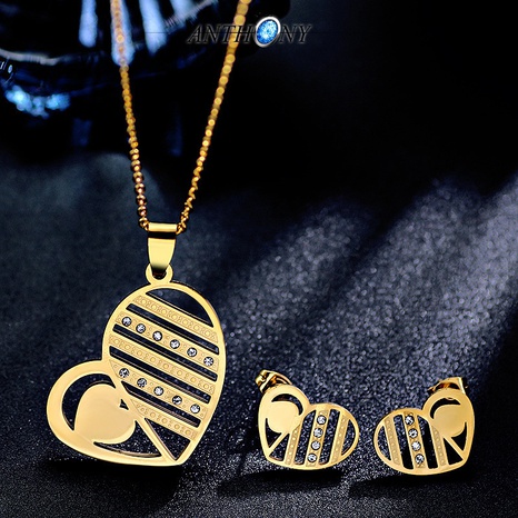 Korean simple stainless steel striped hollow peach heart earrings necklace set female's discount tags