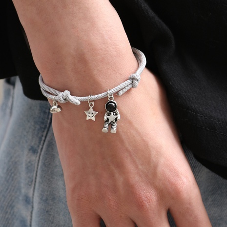 Korean fashion star picking astronaut bracelet couple suction stone a pair of jewelry's discount tags