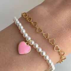 fashion heart imitation pearl hollow chain bracelet jewelry wholesale