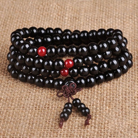 Vintage geometric Knot Sandalwood Buddha Bead Bracelet Wholesale NHYSL629354's discount tags