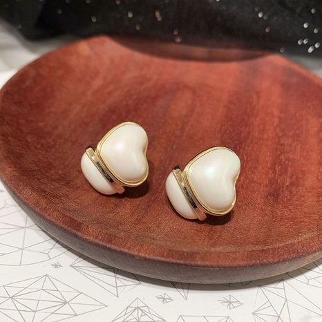 fashion heart pearl copper geometric three-dimensional semi-circle earrings NHWK623060's discount tags