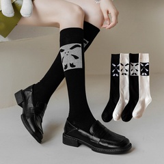 Chaussettes pour femmes de veau chaussettes en coton à hauteur du genou dessin animé mignon noir et blanc en gros