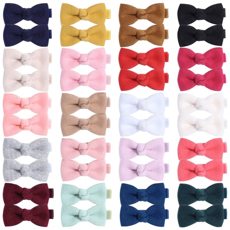 European and American children's hair accessories solid color bow hairpin's discount tags