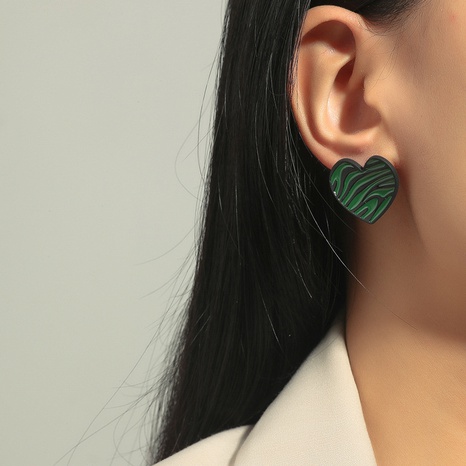 Korean dripping oil leopard print heart-shaped earrings's discount tags