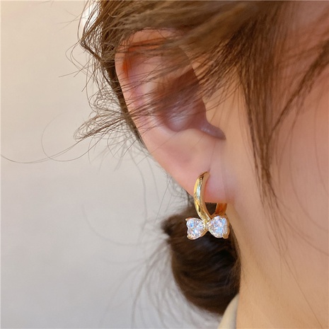 Boucles d'oreilles géométriques nouvelles en cuivre avec un arc de mode's discount tags