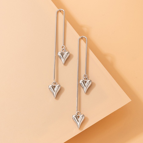 Pendientes en forma de corazón asimétricos geométricos de borla larga de moda simple's discount tags