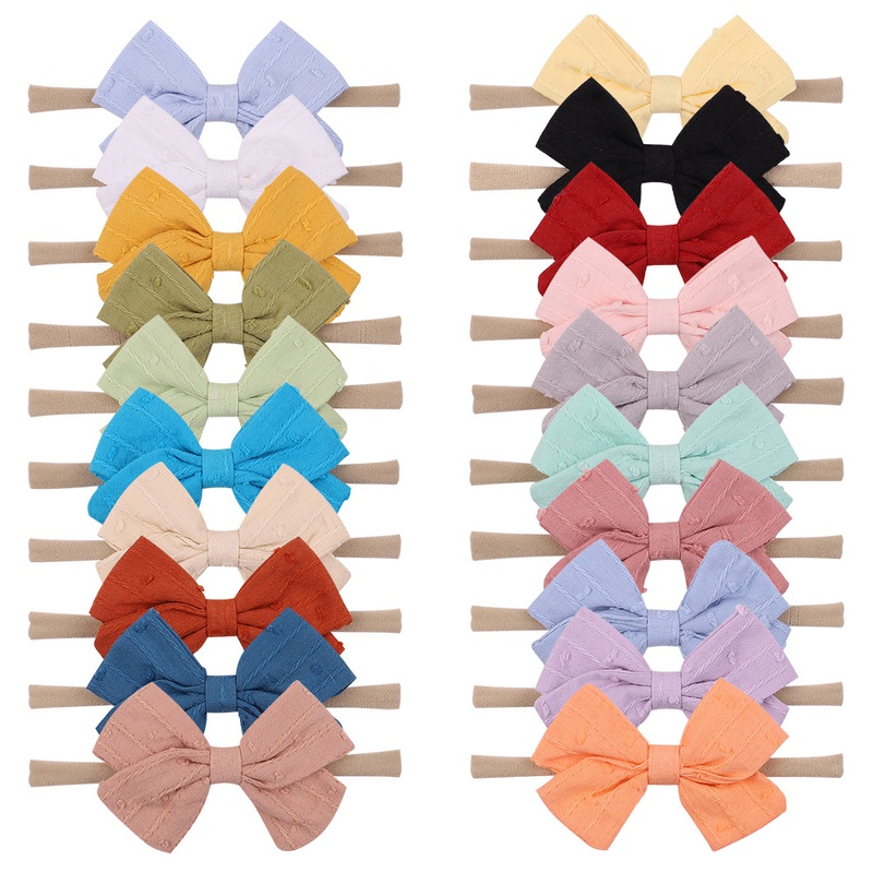 Nouveau bandeau Bowknot pour enfants Bandeau en nylon doux pour bb Accessoires pour cheveux de couleur bonbon