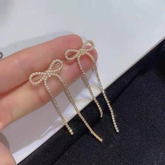 fashion long inlaid pearl rhinestone bow tassel earrings