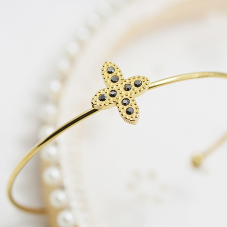bracelet en diamant incrusté en forme de fleur en acier titamium simple à la mode's discount tags