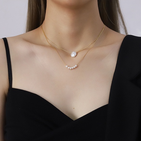 Niche de luxe légère assortie imitation perle baroque titane collier en acier femme en gros's discount tags