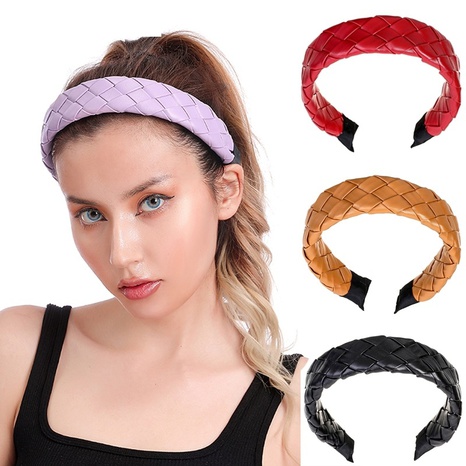 European and American creative leather twist woven cross hair band's discount tags