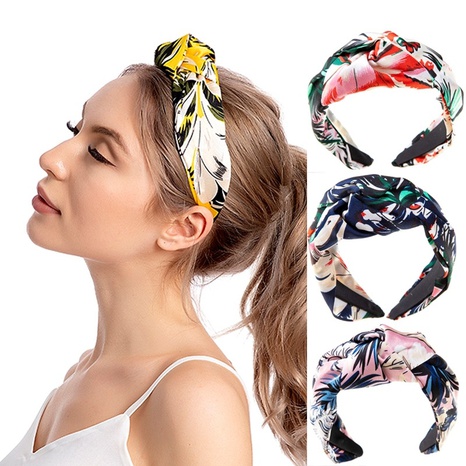 Fashion new printed fabric wide headband knotted cross headband's discount tags