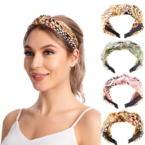 European and American new simple snake print printed fabric middle knotted headband's discount tags