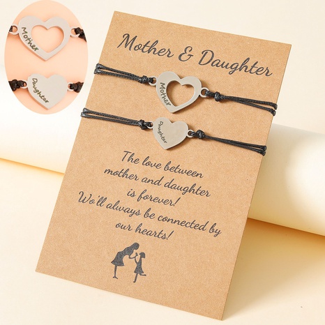 Nouveau bracelet de carte de fête des mères Bracelet tissé en forme de coeur en acier inoxydable avec lettrage au laser's discount tags