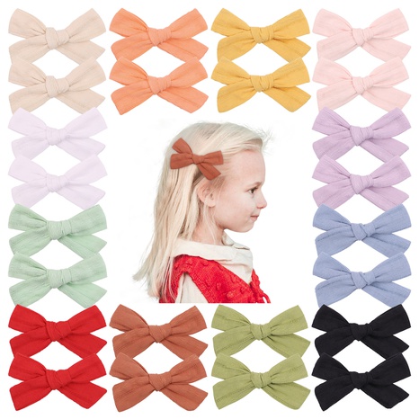 Korean wrinkle cloth bow hairpin student baby hair accessories wholesale  NHYLX584150's discount tags