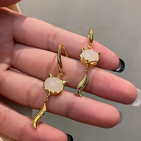 vintage geometric fox creative metal white jade earrings's discount tags