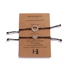 Nouveau bracelet de fête des mères en acier inoxydable en forme de coeur creux en fil de cire tressé bracelet en carte