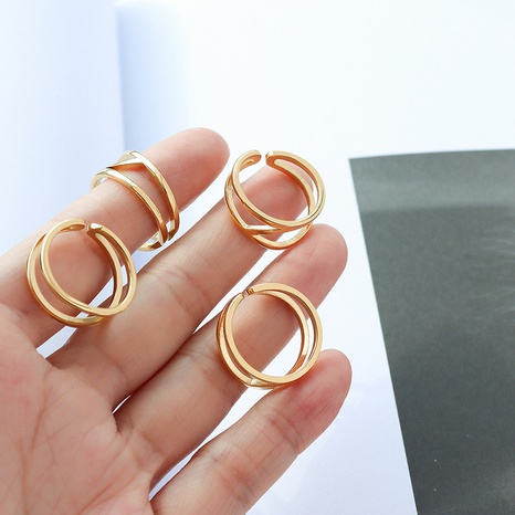 anillo de color sólido de acero de titanio abierto hueco simple's discount tags