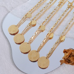 chaîne de couture plaquée or 18 carats en acier au titane pendentif médaille portrait collier boucle OT