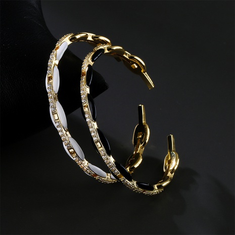 fashion geometric copper micro-inlaid jewelry black and white dripping pig nose bracelet NHFMO585128's discount tags