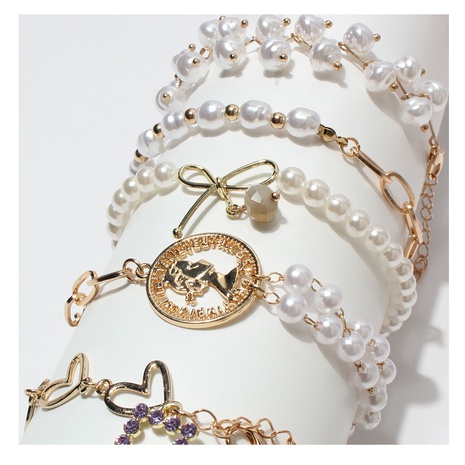 Bracelet de tempérament simple géométrique de cadenas de coeur de perle irrégulière de nœud papillon's discount tags