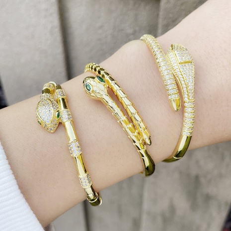 Pulsera serpiente moda femenina cobre lleno de diamantes pulsera de lujo ligera's discount tags