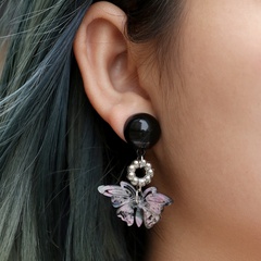 fashion geometric black and white hollow butterfly pendant earrings