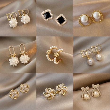 Sweet Geometric Flower Bow Knot Imitation Pearl Alloy Rhinestone Tassel Women'S Earrings 1 Pair's discount tags