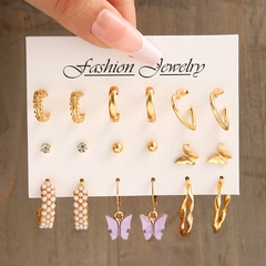 Fashion Heart Shape Butterfly Alloy Plating Inlay Rhinestones Pearl Women'S Earrings 1 Set