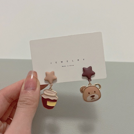 Korean style star honey pot bear earrings cute cartoon dripping oil asymmetric earrings's discount tags