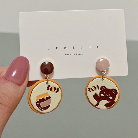 Korean cute honey bear earrings sweet and cute dripping oil asymmetric earrings's discount tags