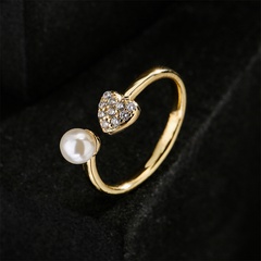 Bijoux pour femmes de la mode européenne et américaine simple anneau ouvert de perle de zircon de coeur de cuivre