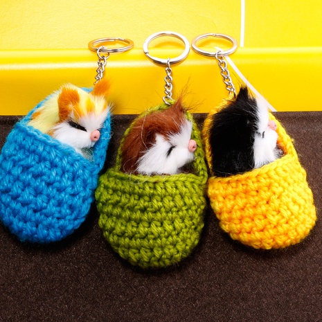 creative autumn and winter sleep cat hair ball keychain pendant's discount tags